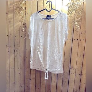 White t-shirt with gold cherries all over.